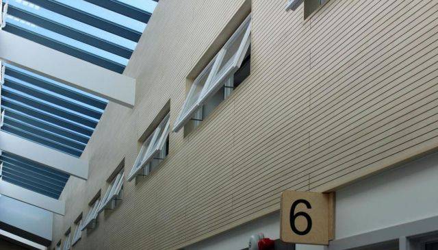 Continuously Slotted Acoustic Wall Lining