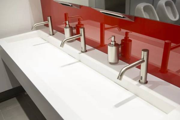 The Radius Wall Mounted Cylindrical Manual Soap Dispenser