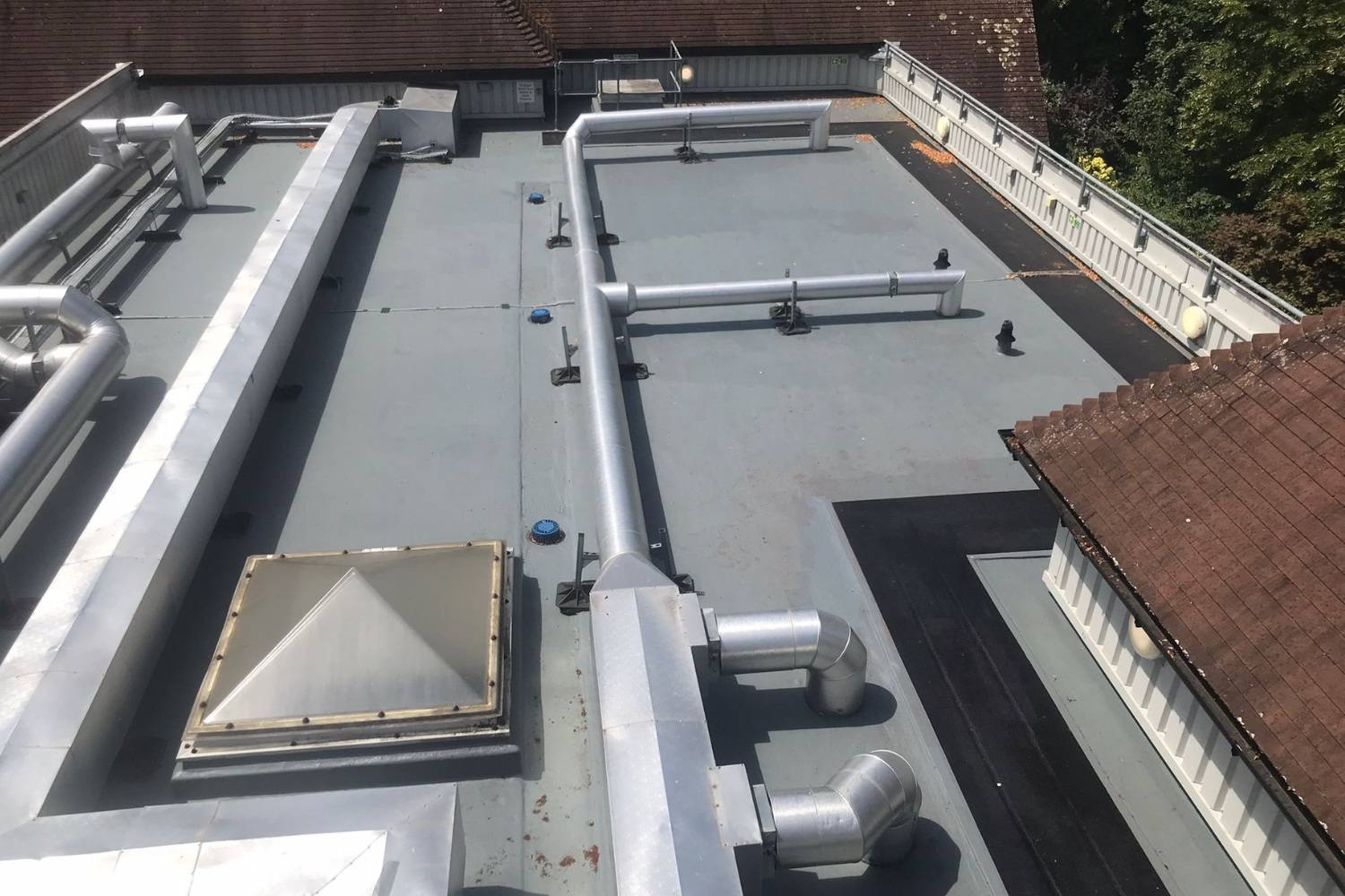 RapidRoof Pro 800m² Healthcare roof refurbishment | Liquid Roofing ...