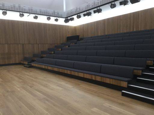 Retractable Seating with Bench Seating and End Aisles