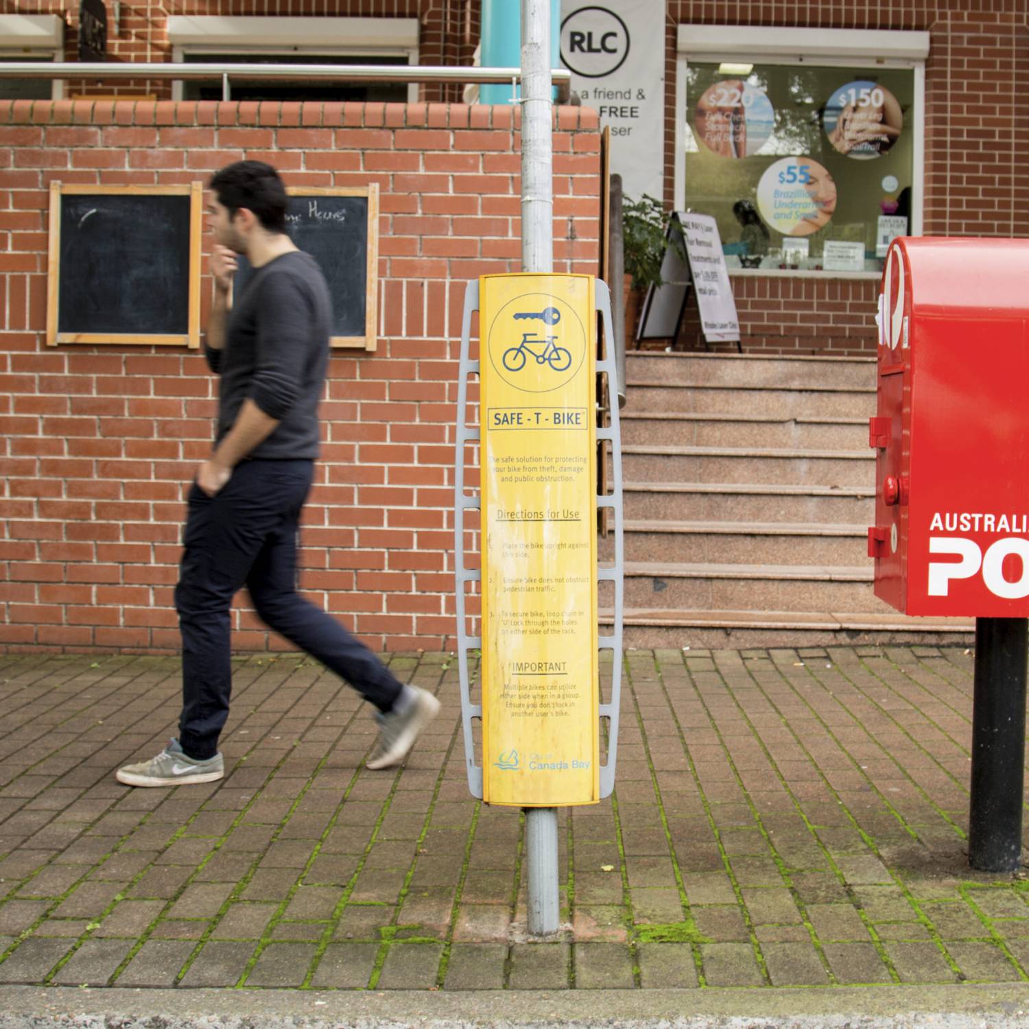 FlexiSecure Pole-Mounted Bike Rack with Integrated Signage