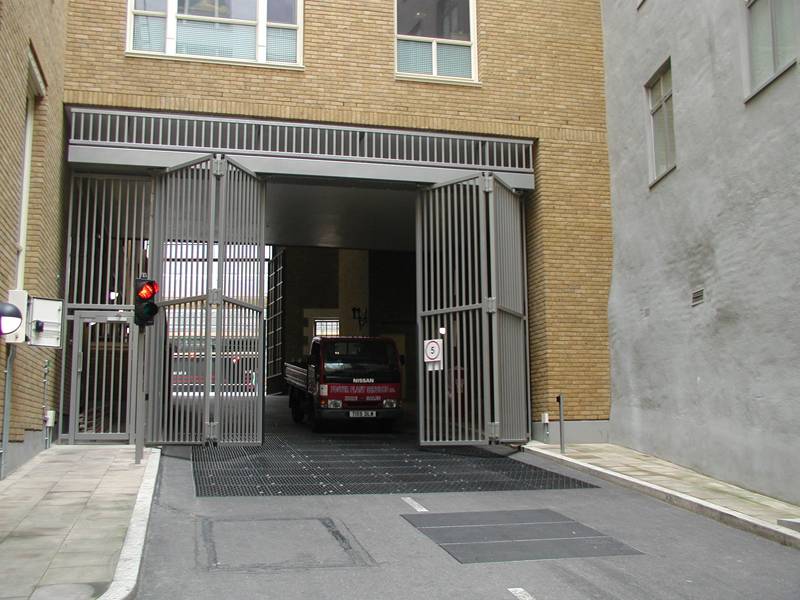 CSG 10601 Overhead Tracked Bi-Folding Security Gate - Security Gate