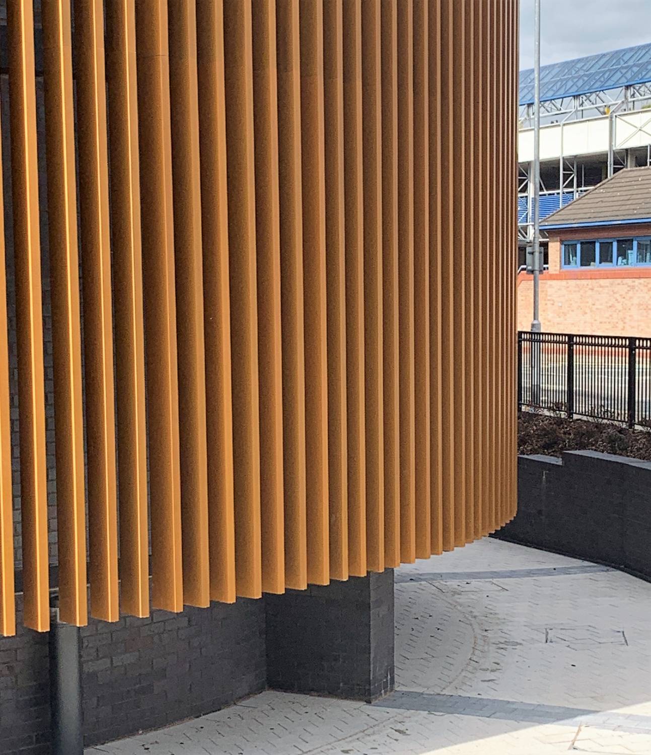 Wood finish powder coating to realise vision of a timber facade ...