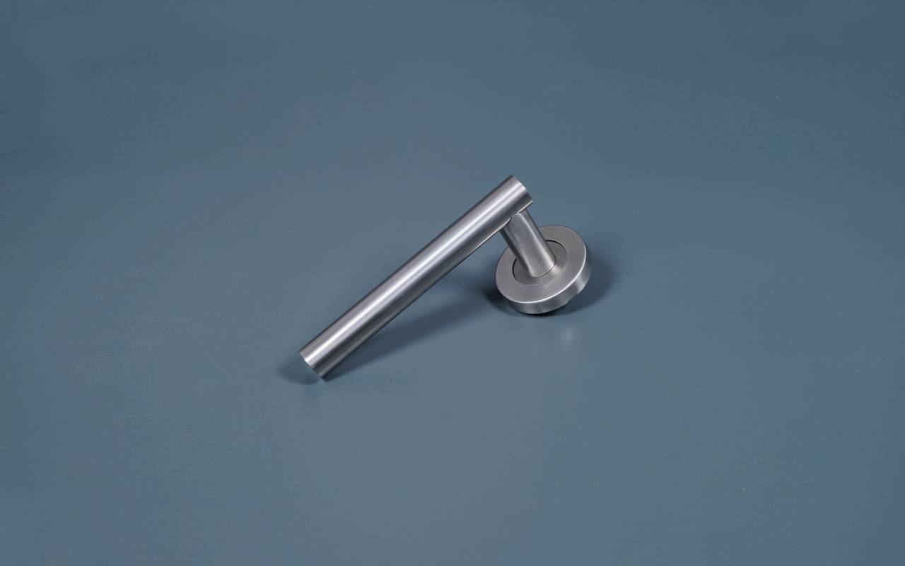 Stainless Steel T-Bar Lever Door Handle On Round Rose - BLU™  KM065