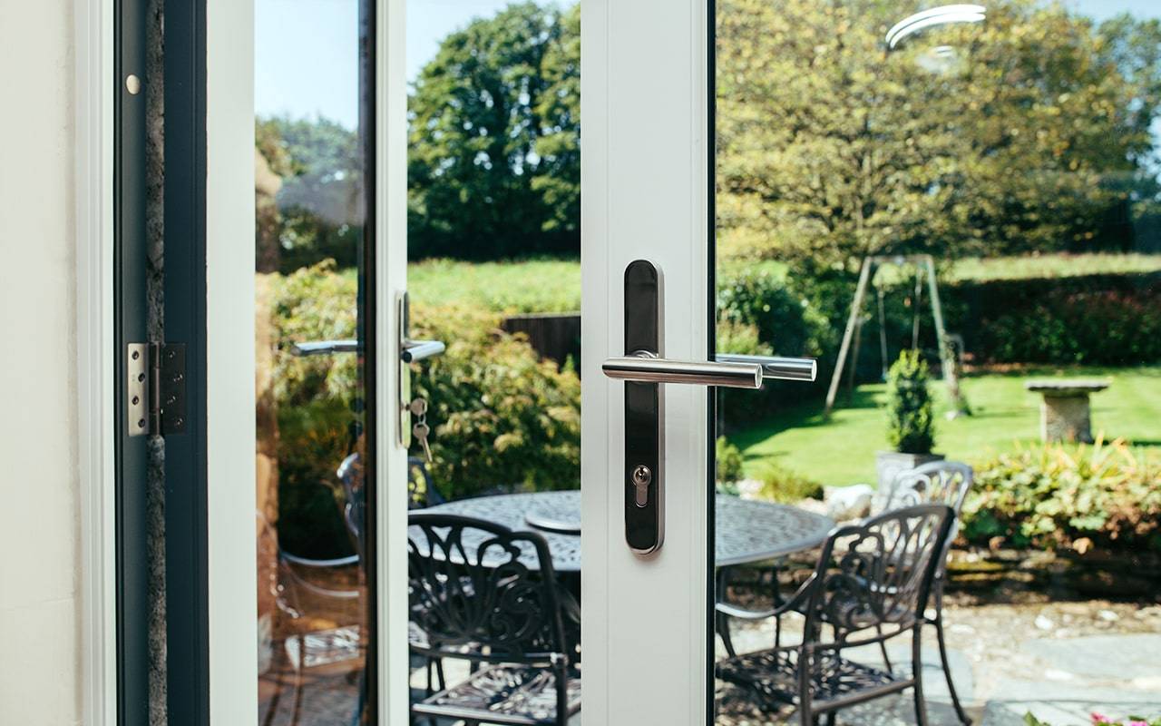  Mitre Lever Door Handle on Backplate - BLU™ KM078B | Coastal Group