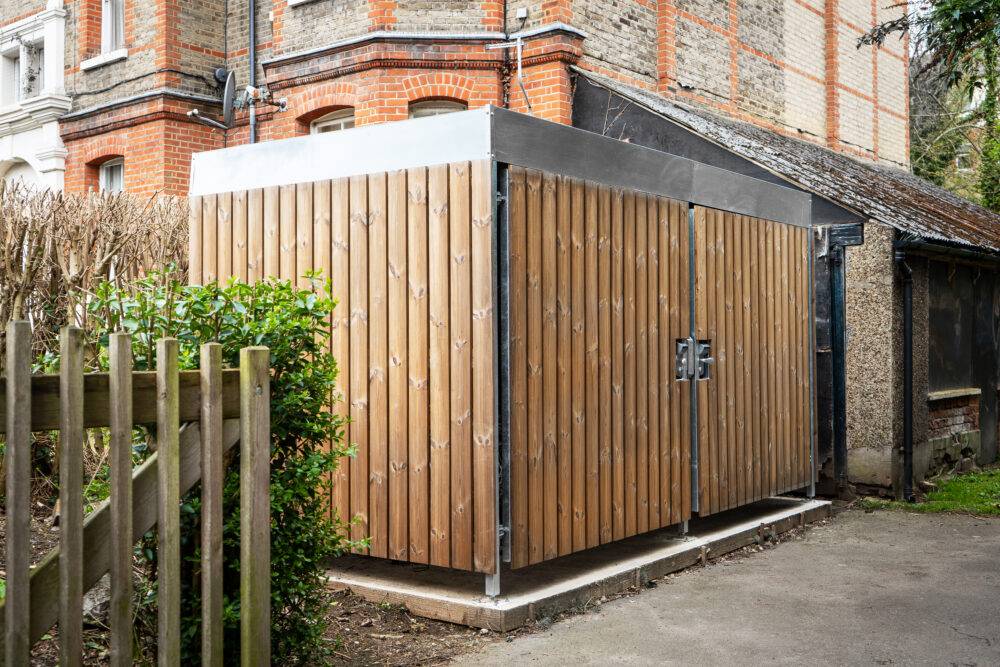 Wood Bike Shelter | Cyclehoop | NBS Source