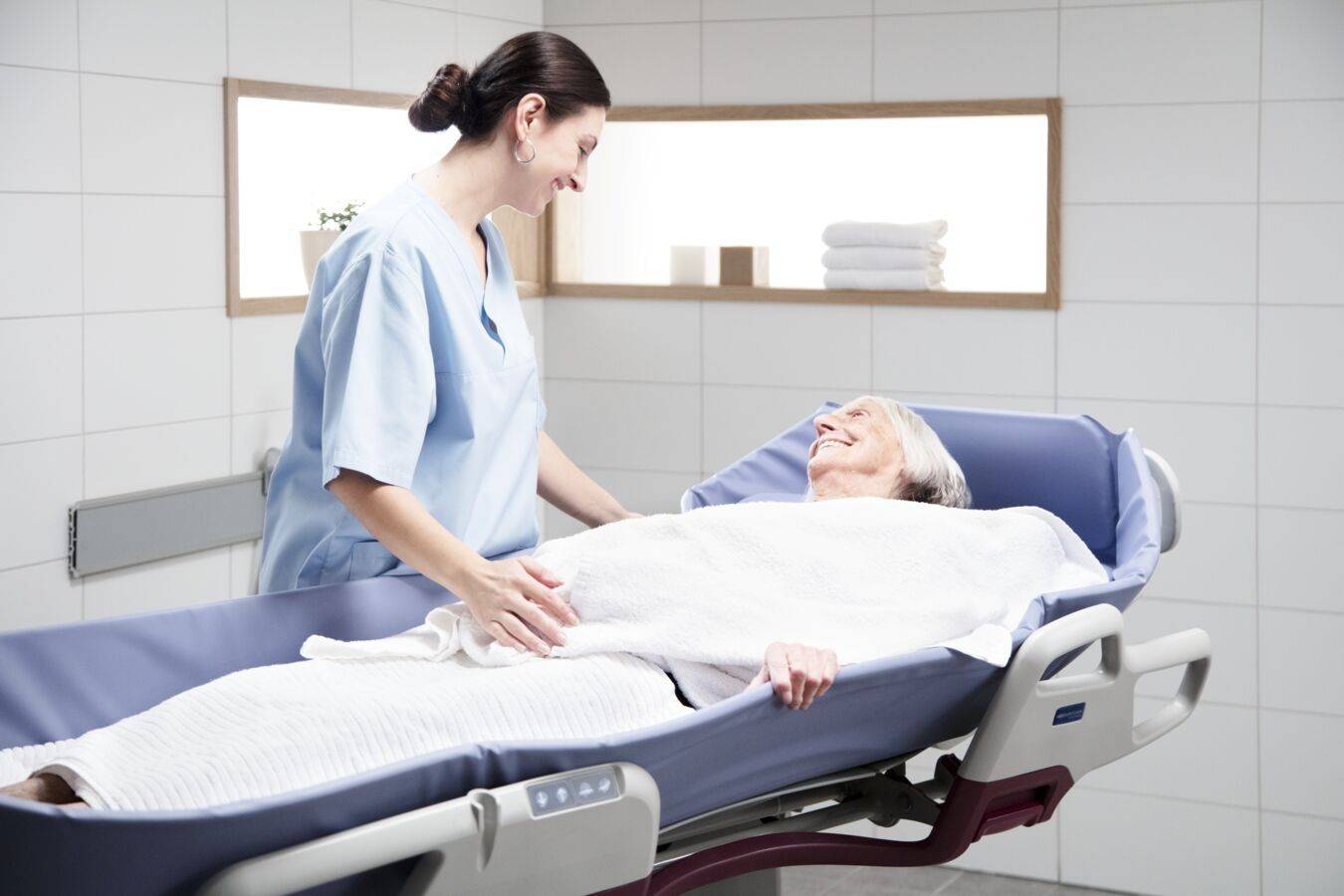 Carevo® - Height Adjustable Shower Trolley - Shower/ Changing Trolley