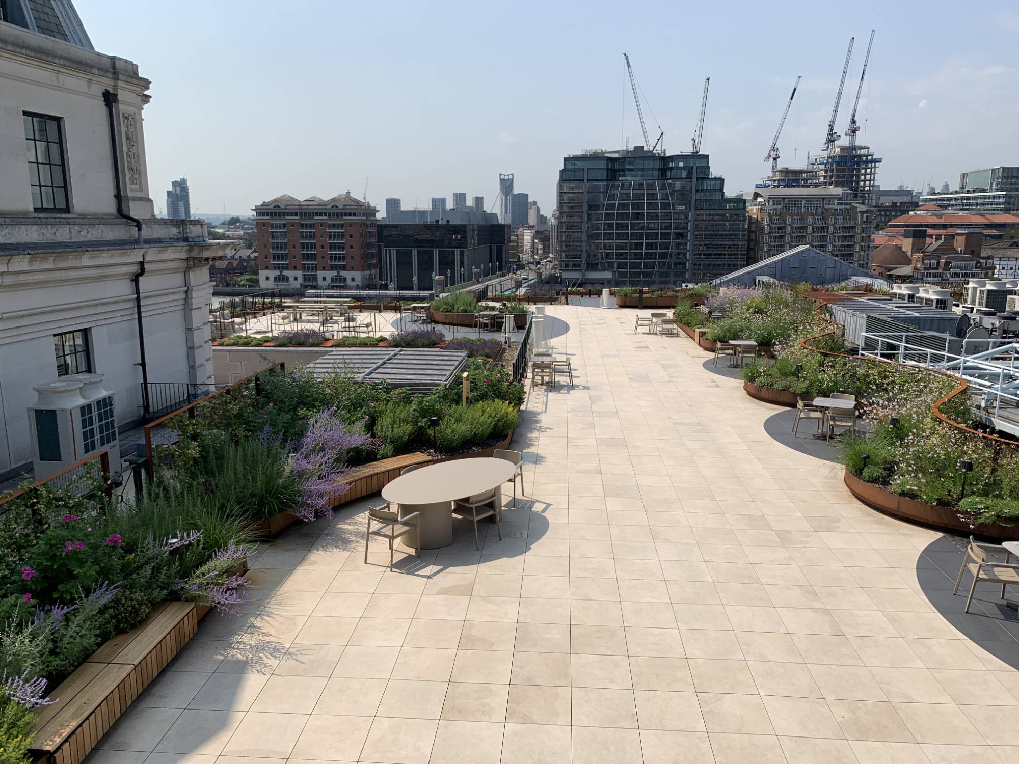 Inverted Roof slabs on pedestals and cobble perimeter - Liquid Applied ...