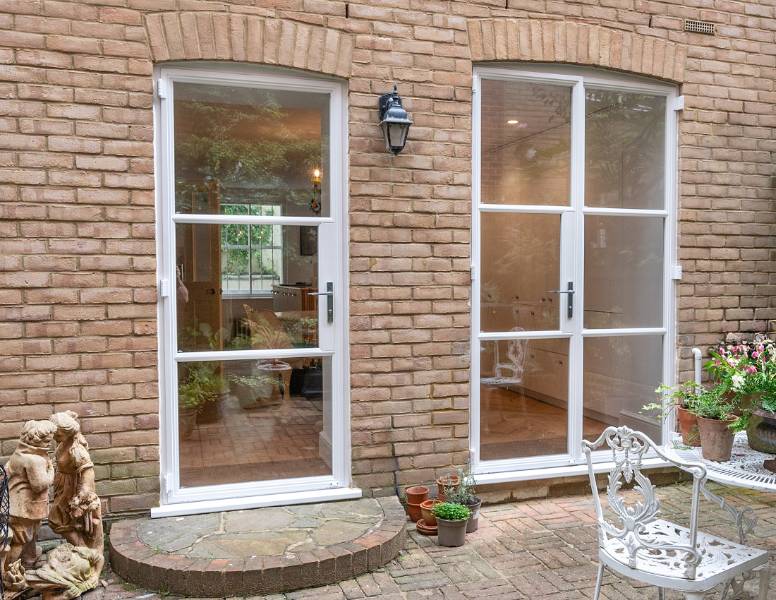 Elegant, white steel doors chosen for Regency Town House