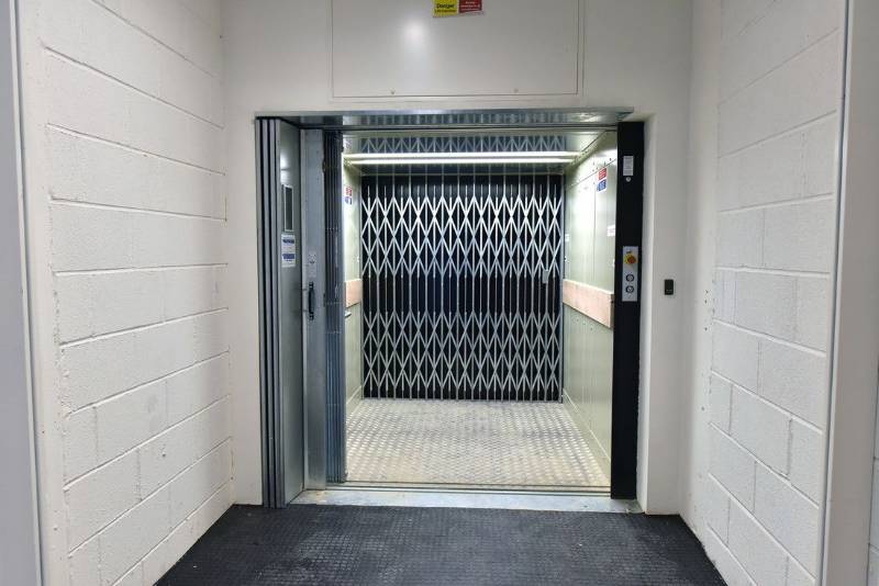 A Stannah Goods Lift Solves Bike/Bin Storage in City Office Refurb