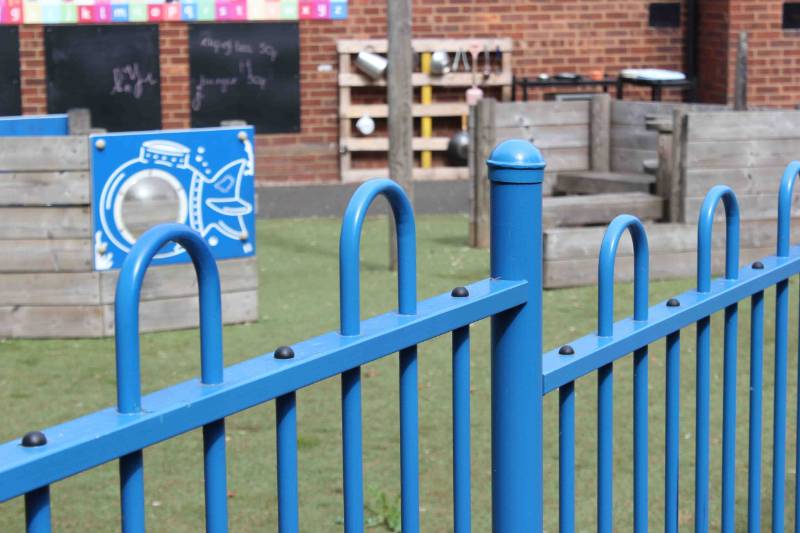 Downe primary school chooses anti-trap bow top fencing for safe playground environment