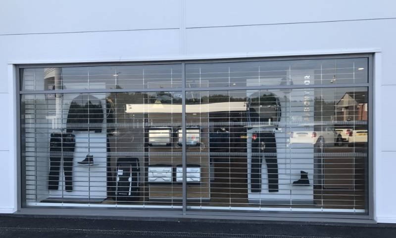 Stainless Steel Security Rolling Grilles at BMW Motorcycle Showroom, Manchester