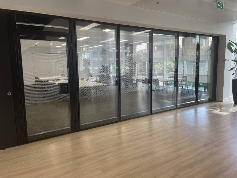 Dorma Variflex Glass Semi automatic acoustic moveable wall - AECOM offices, Scotland