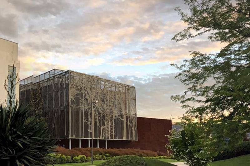 Italia-Corten Steel Louvres contrast with Stainless Steel Mesh