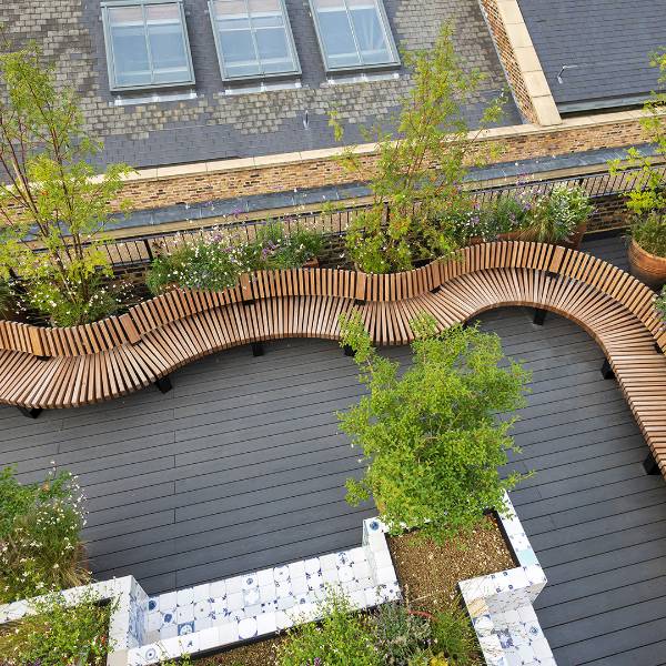 Wavy seating on private members club roof terrace
