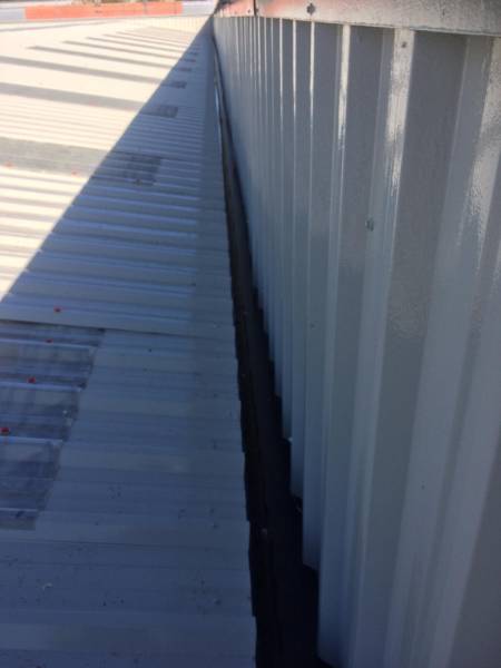 Metal roof & parapet coating project using Metalseal 20 from Liquasil