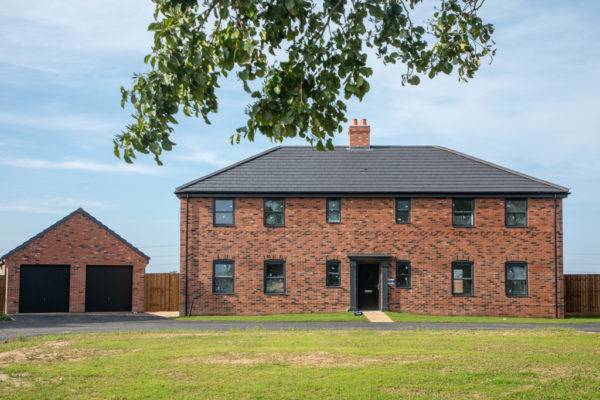 Spectus vertical sliding windows fitted in prestigious new build development