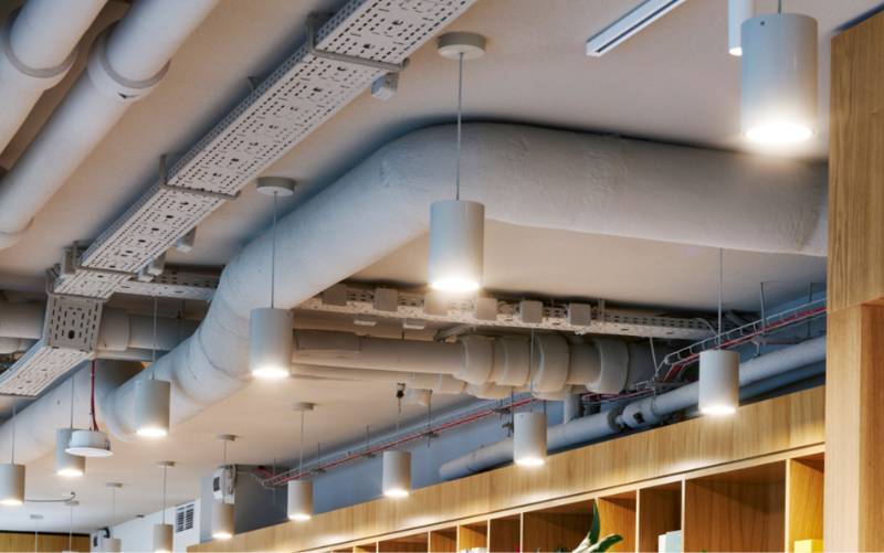 Seamless acoustic ceiling provides an industrial feel for Spaces Platinium's co-working office