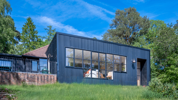 Modern extension using steel framed windows and doors maximises views and natural light