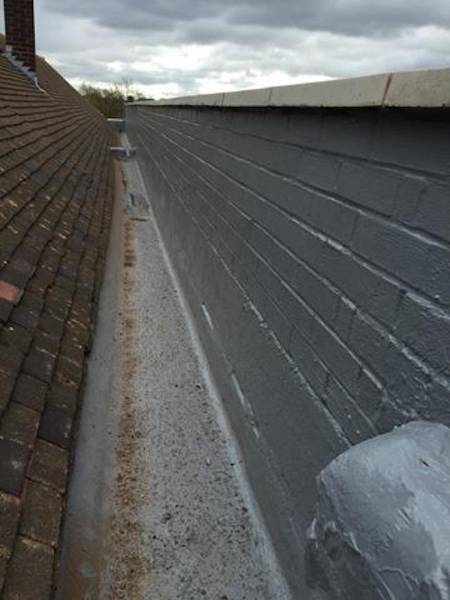 Concrete Gutter Repair with Liquasil's liquid gutter lining system