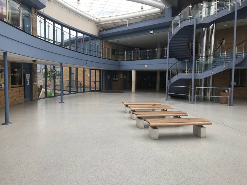 Decorative and seamless flooring supplied for atrium area to Radclyffe School