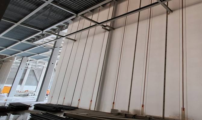 Overcoming the Risk of Critical Delays in Construction - Using Weathering Screens to Mitigate Impact on Critical Path Activities 