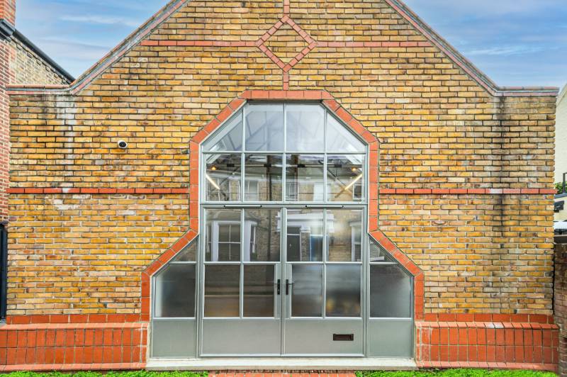 Bespoke, statement double door screen creates one fantastic entrance!