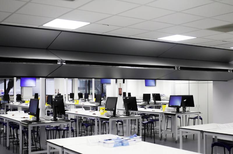 Skyfold fully automatic vertical rising Acoustic moveable wall installed by Style Divides Top University Laboratory