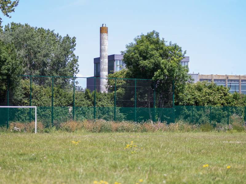 Ball stop fencing protects sewage treatment site