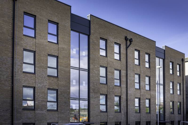 Spectus Elite 70 specified for high profile affordable housing development. 150 Spectus Elite 70 flush tilt and turn windows were specified in the development of 26 flats in the centre of Paisley