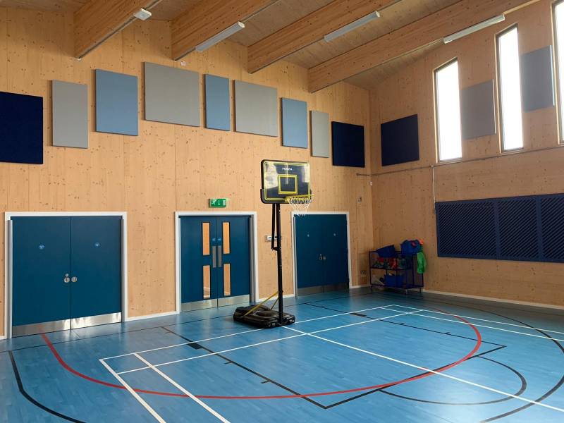 Reverberation solution for new sustainably-designed school sports hall