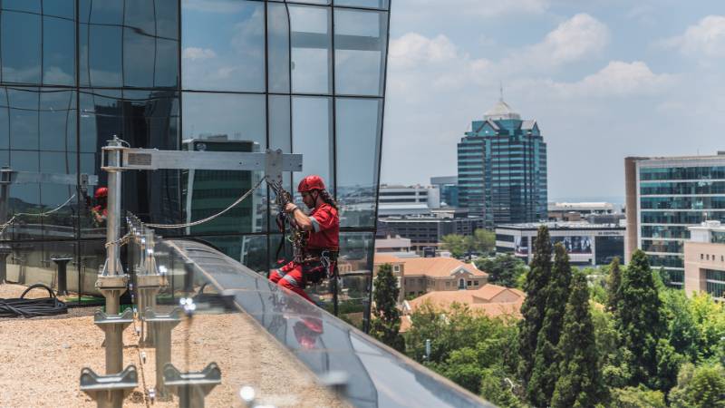 Davit arm on a commercial mall for façade access