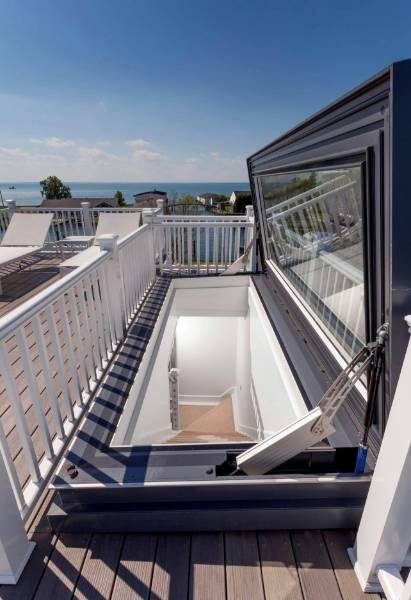 Skydoor Roof Access Rooflight Has Helped Open The Roof Space Of Beautiful Holiday Home Located In Michigan