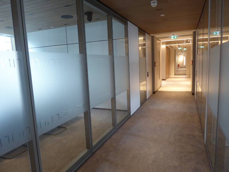 Dorma Variflex Glass Semi automatic Acoustic moveable wall combined to make multiple meeting rooms (Anglo American offices)