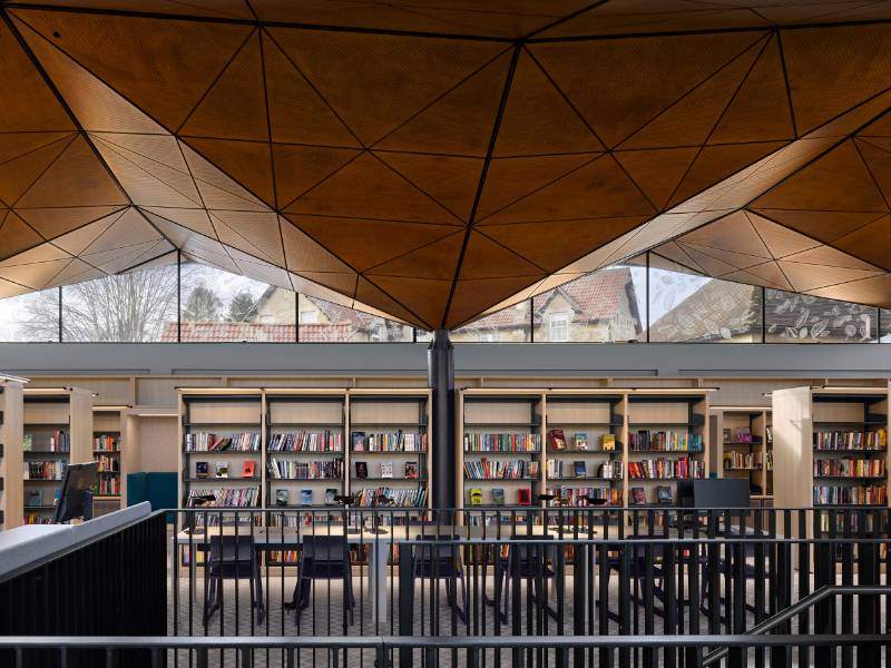A FALSE CONTINUOUS CEILING FROM INSIDE TO OUTSIDE FOR THE LIBRARY AT ST. MARY’S CALNE SCHOOL