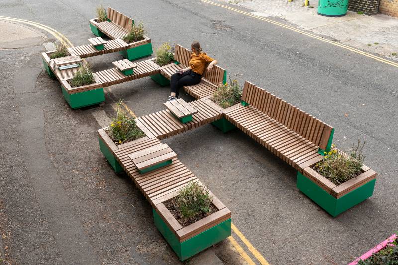 Modular seating and planters creates parklet solution