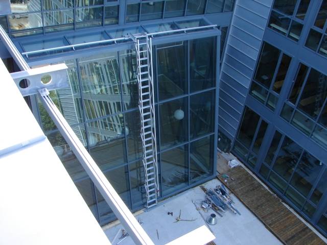 Travelling ladder access systems