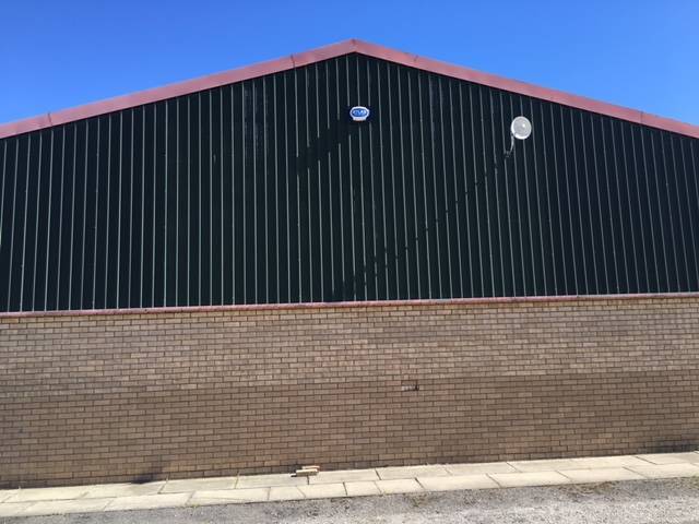 A Cladding Refurbishment Project with Specific Colouring Requirements