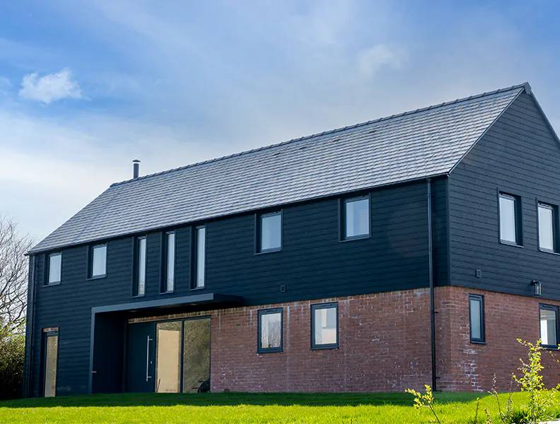 Contemporary Home Using Composite Cladding in Charcoal