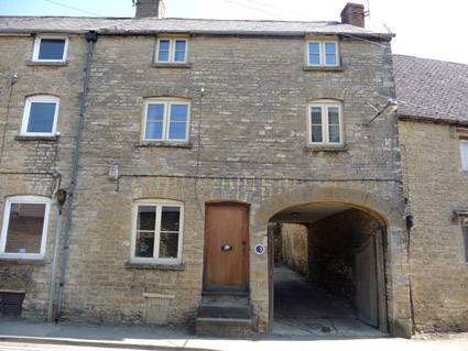 Stone cottage structurally secured without disruption