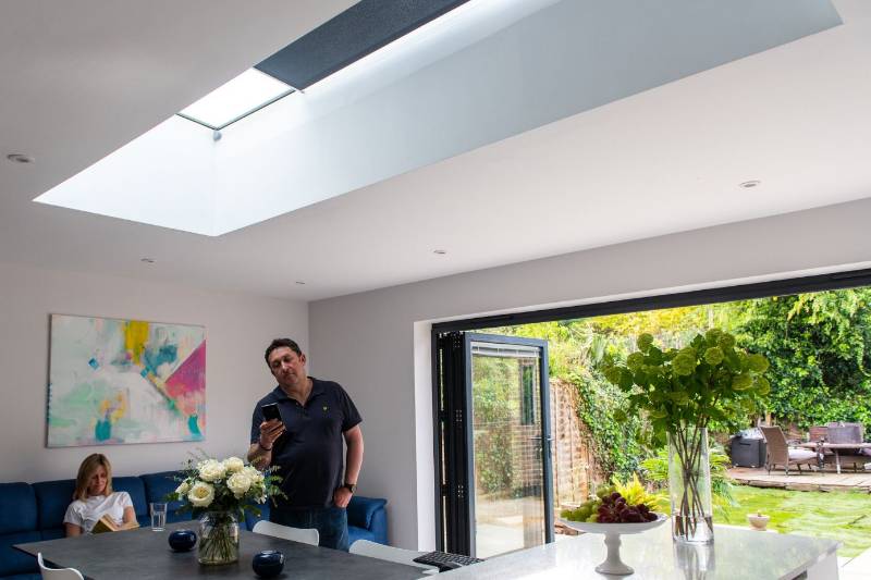 Stunning custom - made rooflight & blind transform Sussex renovation