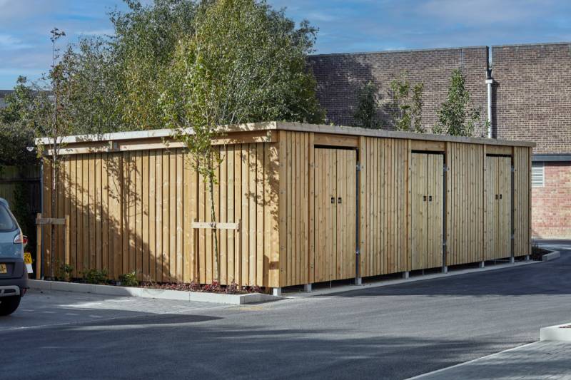 Timber street furniture elevates the outdoor space at Hawkins Road