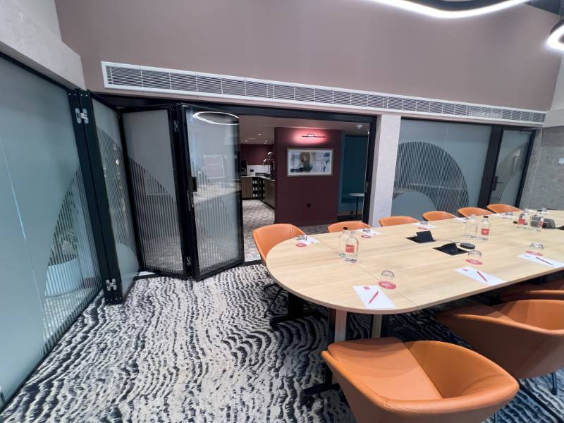 Stylefold Hinged sliding folding Glass moveable wall - Leonardo Hotel, London