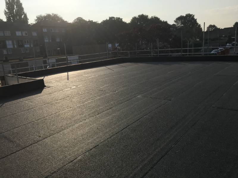 Flat roof covering systems