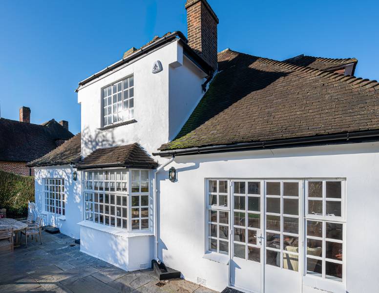 New cottage pane steel windows and doors for Arts and Crafts London home