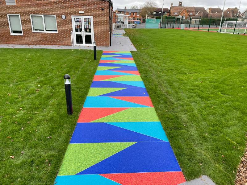 Recycled, fun, and accessible resin bound paving for school pathways