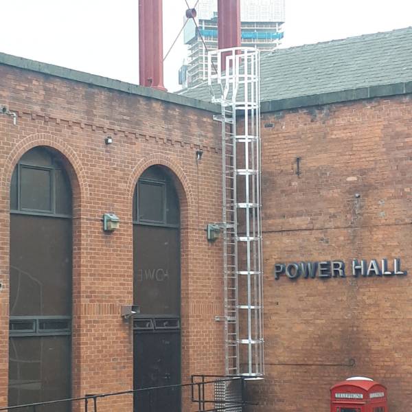 Fixed utilitarian access system - permanently-fixed vertical access ladder to Museum of Science & Industry - Manchester