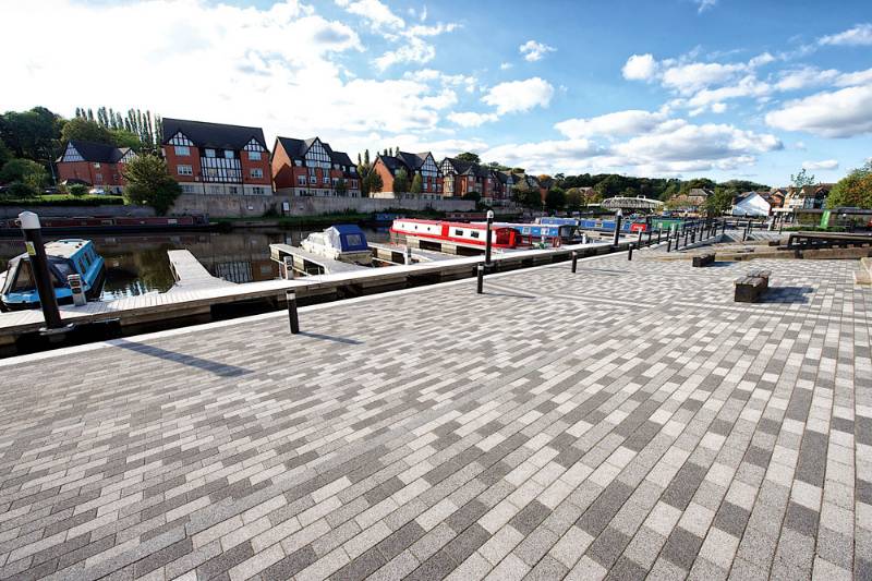 Plaza Paving + Flags - Premium granite water-etched paving
