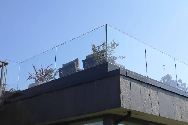 MEGAgrip frameless glass balustrade installation for golf course in Cornwall.