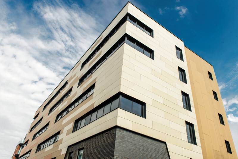 CEMBRIT FIBRE CEMENT CLADDING WRAPS STUDENT ACCOMODATION IN WARM COLOURS